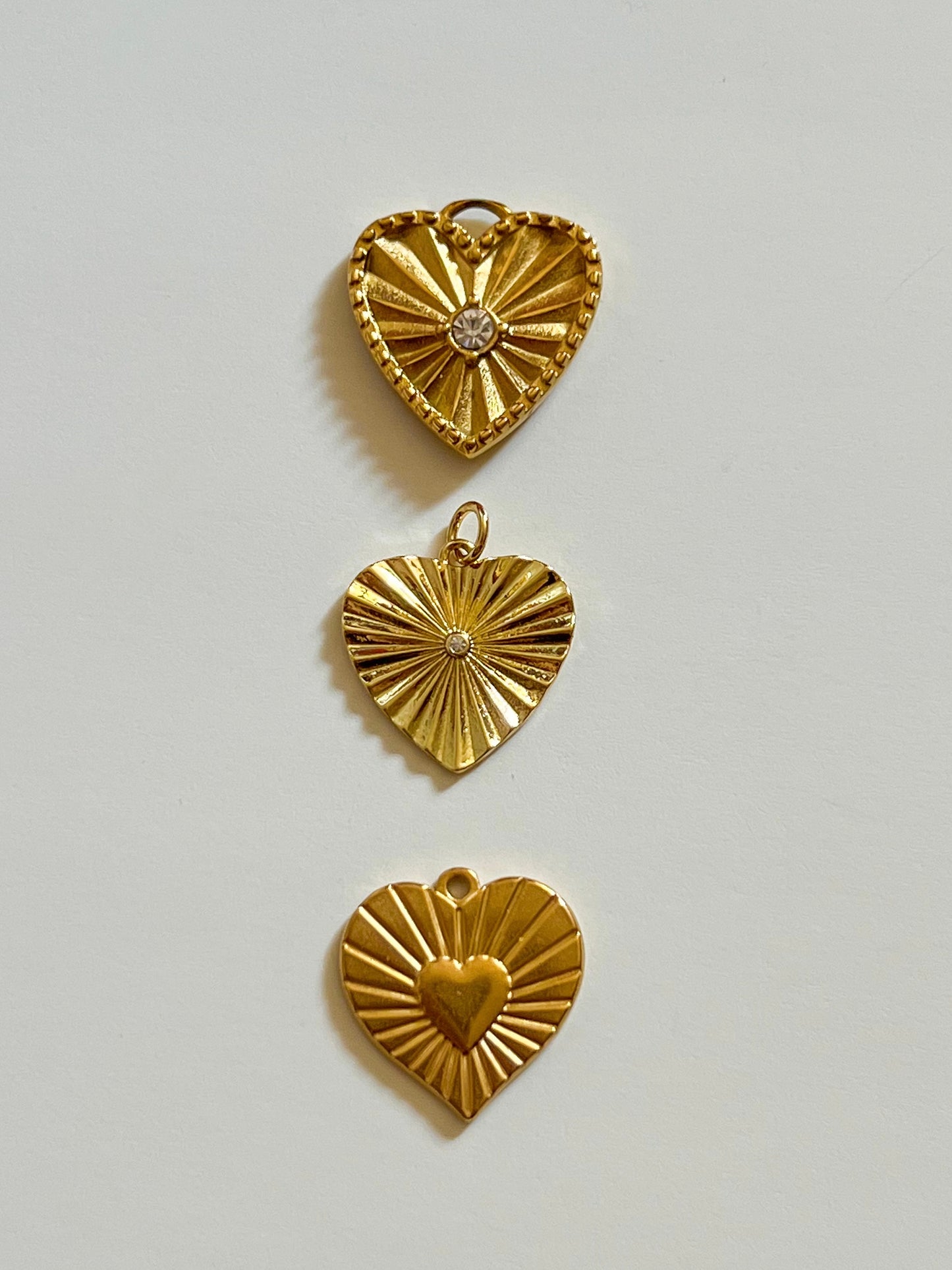 Sunburst heart charm