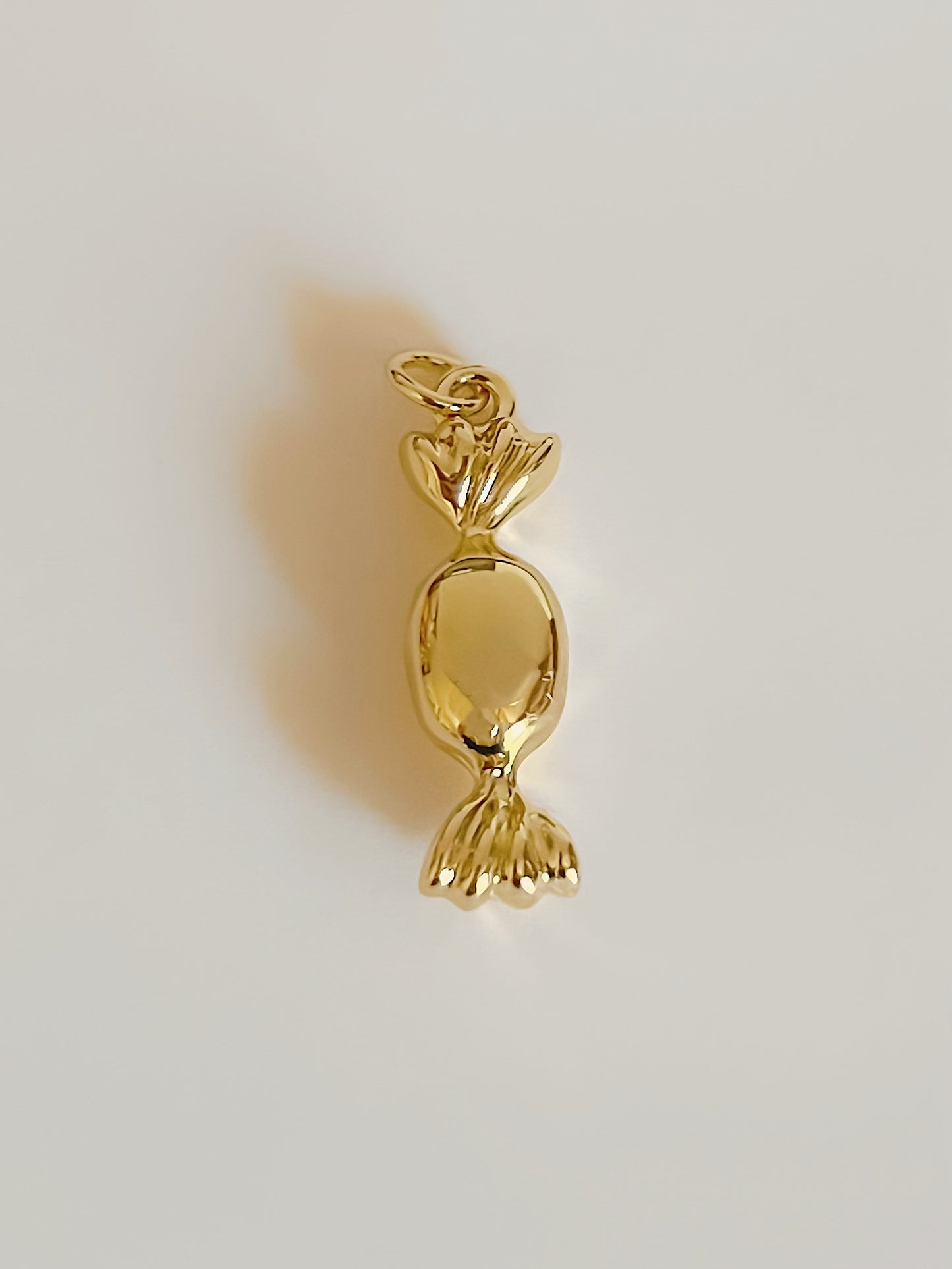 Golden candy charm