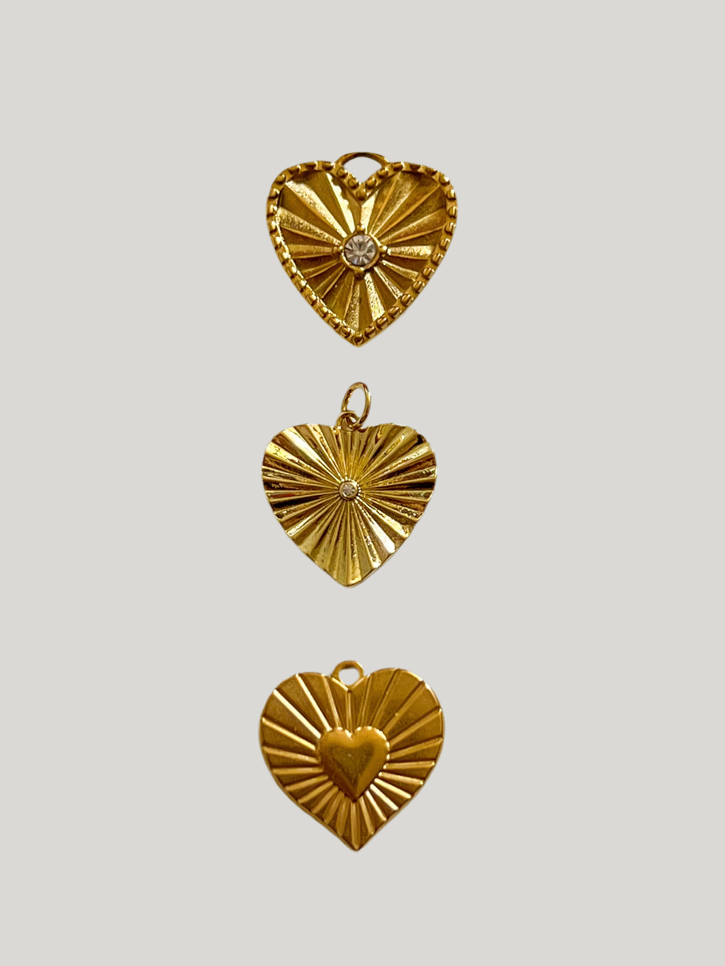 Sunburst heart charm