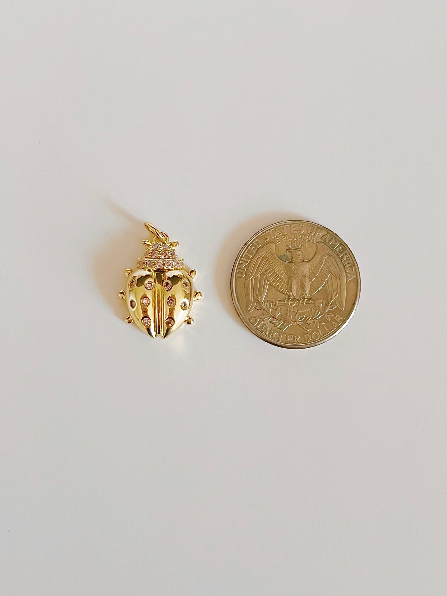 Golden ladybug charm