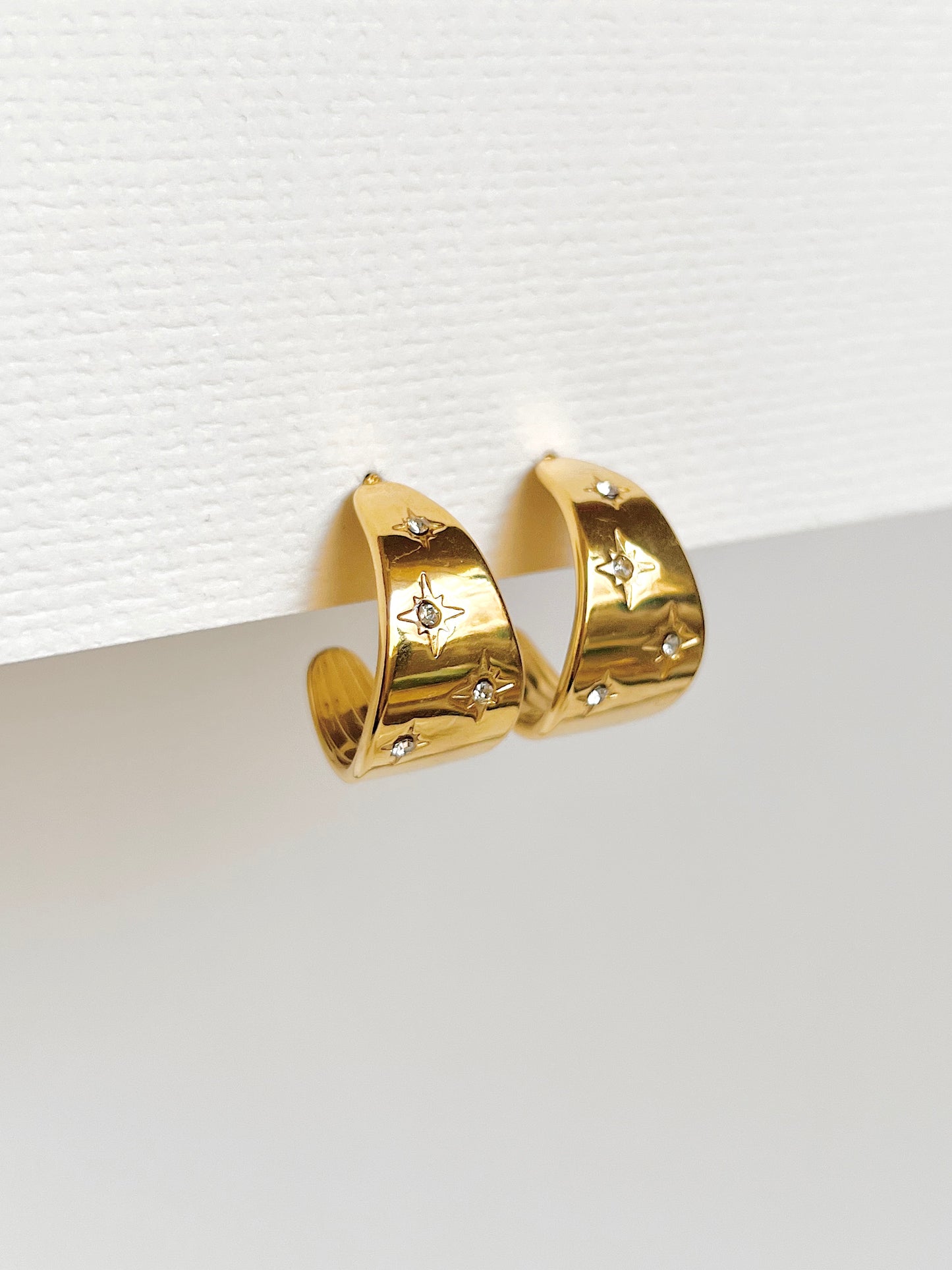 Cosmic hoop earring