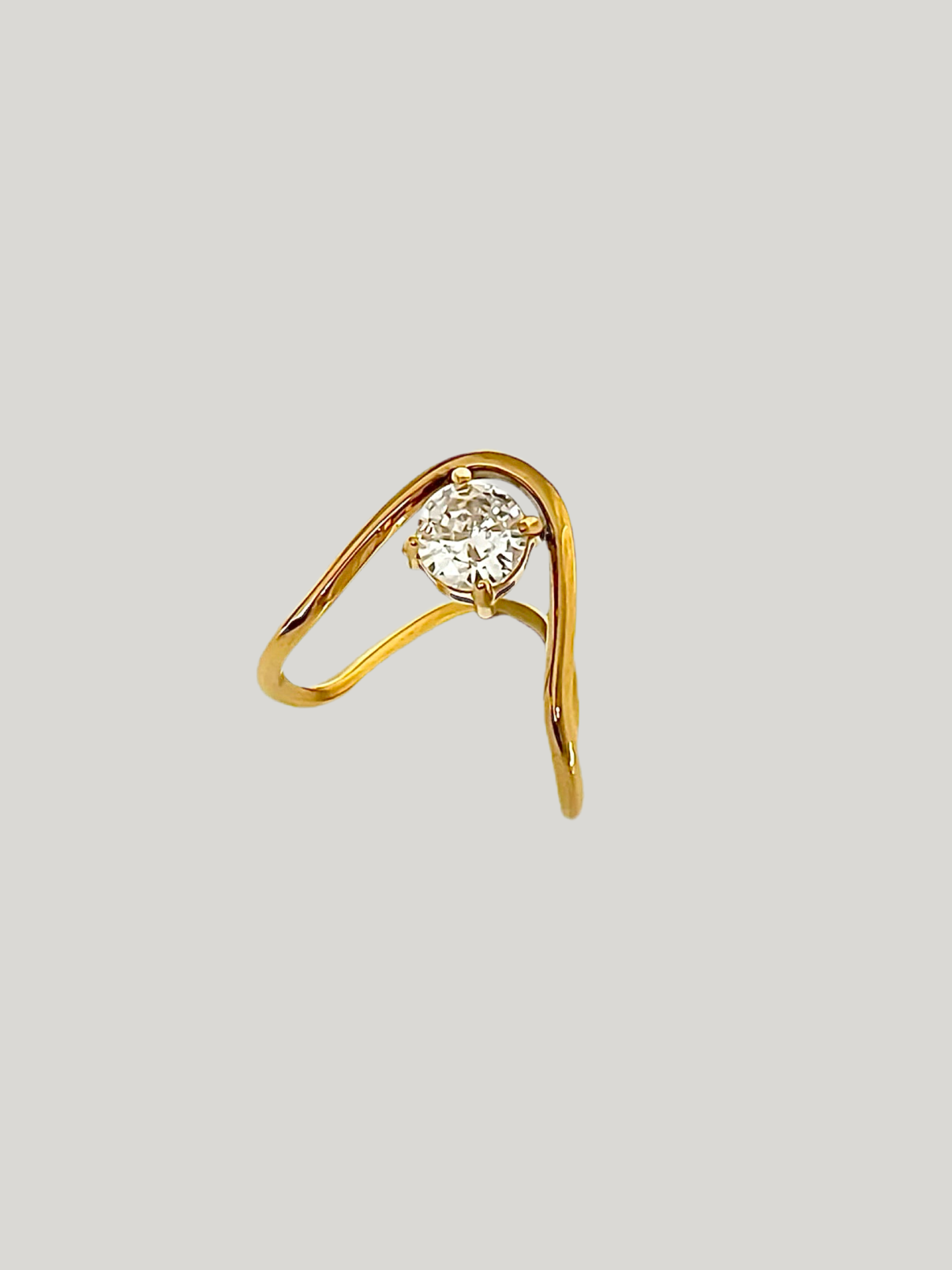 Irregular shape solitaire ring