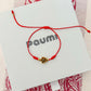 Rosette cord bracelet