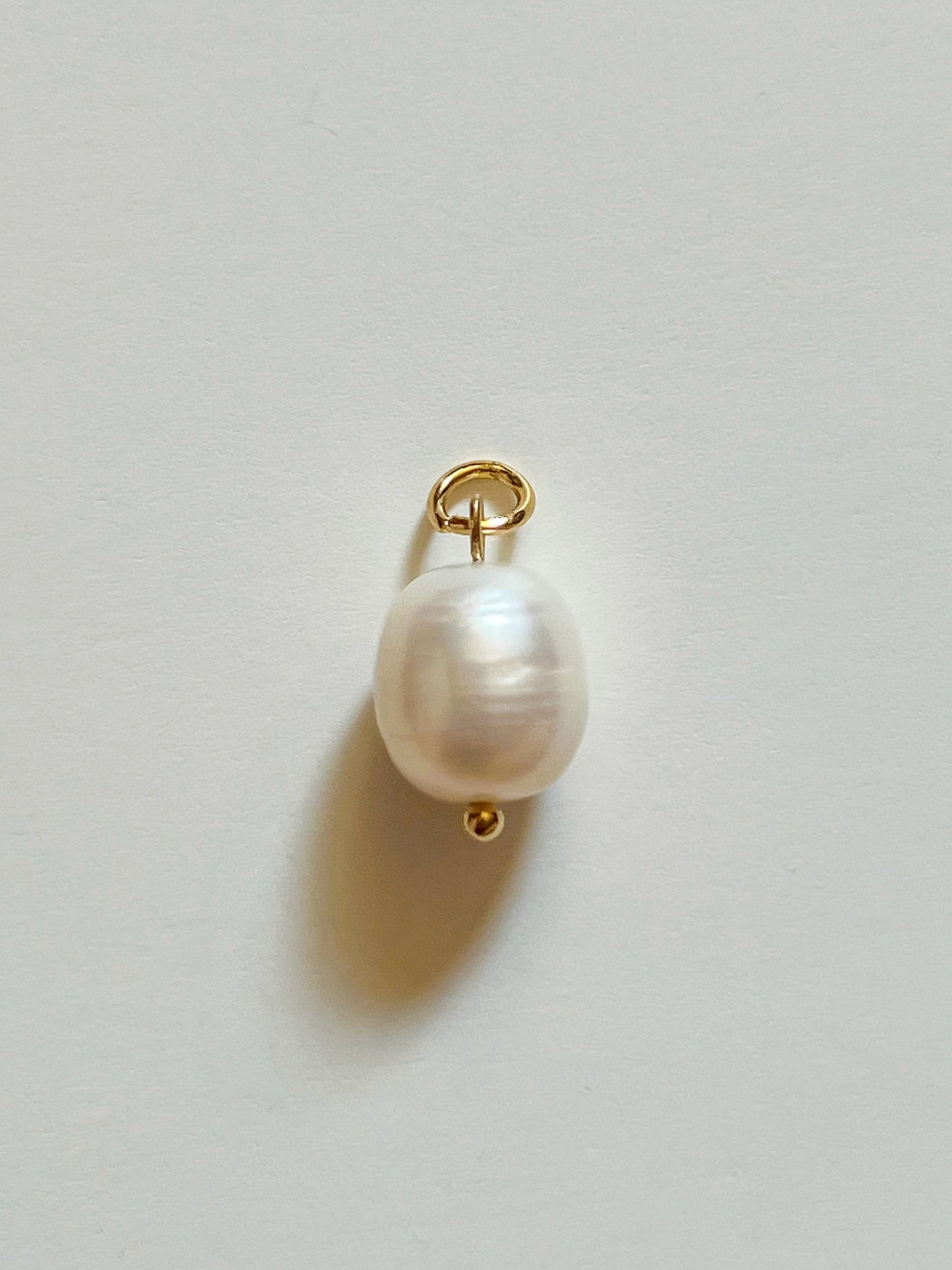 Single pearl charm